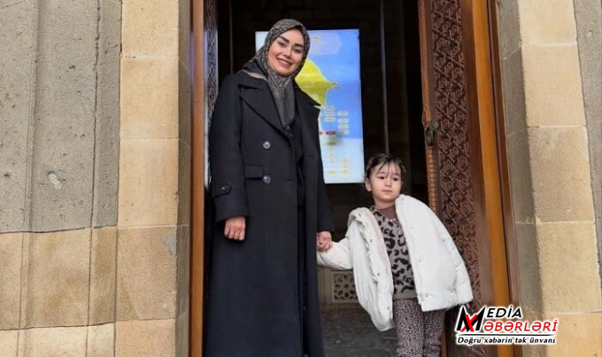 63 yaşlı nazirin 30 yaşlı xanımı Bakıda - Foto