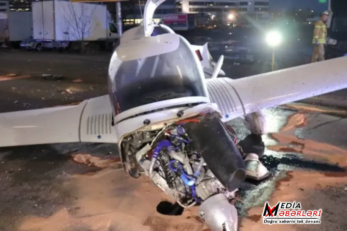 Almaniyada təyyarə insanların olduğu küçəyə eniş edib, yaralılar var Almaniyada təyyarə insanların olduğu küçəyə eniş edib, yaralılar var