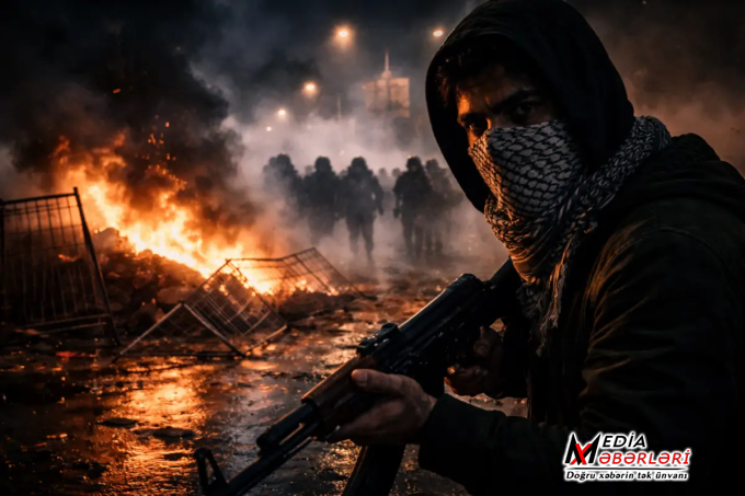 İranda etirazlar silahlı qarşıdurma mərhələsinə keçib İranda etirazlar silahlı qarşıdurma mərhələsinə keçib