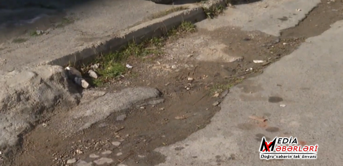 "Binaya su fasilələrlə verilir, amma yenə də küçəyə axır" - Sakinlərdən ŞİKAYƏT