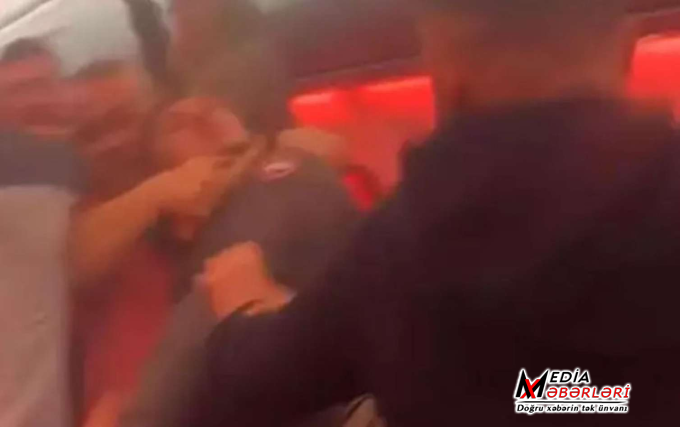 Təyyarədə dava düşdü: TƏCİLİ eniş edildi - VİDEO